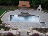 Custom_Pool_Deck_Pergola_Outdoor_Fireplace
